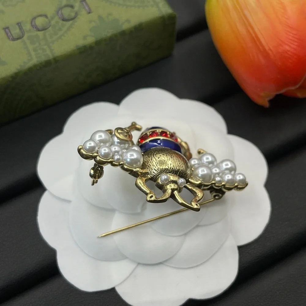 Gucci Gold-Tone Bee Brooch with Pearls and Red & Blue Enamel